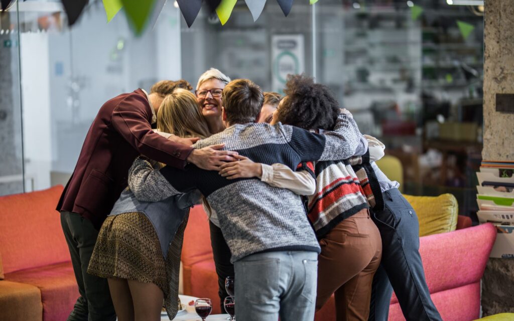 A group of people hugging