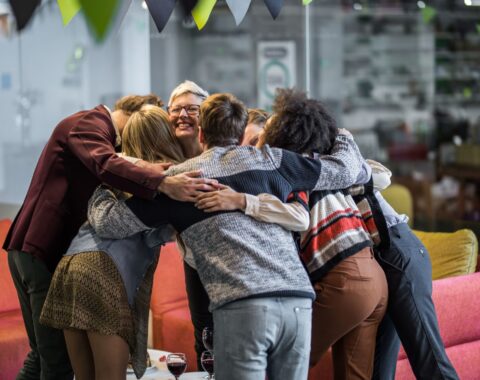 A group of people hugging